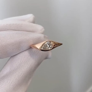 East West Pear Moissanite Ring: 14k Rose Gold Bezel Solitaire