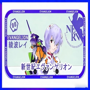 May include: A rectangular graphic featuring the text "EVANGELION" in multiple locations. The image includes an illustration of a character with short, light purple hair and red eyes, and a purple, orange, and green robot. Japanese text is also present.