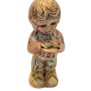 Vtg Ceramic Figurine Of Child Holding Basket With Detailed Hand-Painted Features