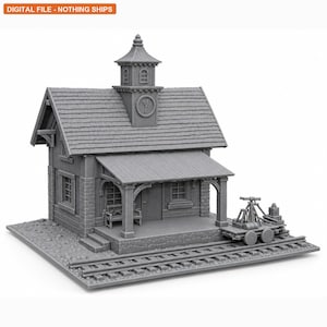 May include: A gray 3D printed miniature train station building featuring a clock tower, a covered porch with a bench, and a small rail cart on tracks. The text "DIGITAL FILE - NOTHING SHIPS" is visible in the top left corner of the image.