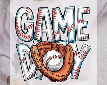 May include: White iron-on transfer with a baseball glove, baseball, and the words "GAME DAY" in a blue and red baseball stitch design.