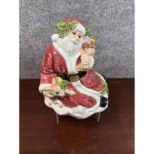 VTG keramische zittende kerstman met hert en speelgoed koekjestrommel met deksel