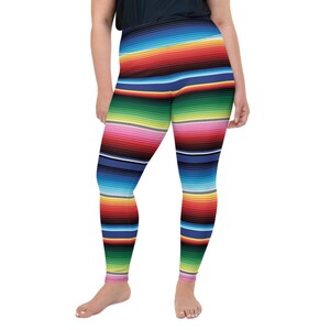 May include: Colorful leggings with a striped pattern reminiscent of a traditional Mexican blanket. The leggings are a vibrant mix of red, blue, green, yellow, and pink.