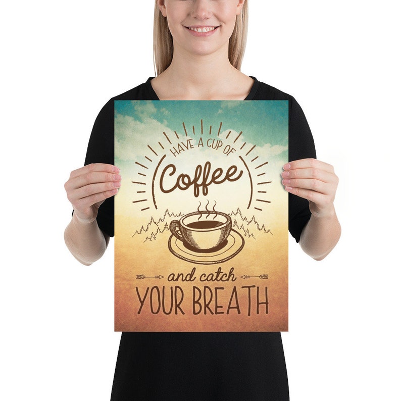 May include: A vintage-style poster with a brown background and a blue sky with clouds. The poster features a steaming cup of coffee with the text "Have a cup of coffee and catch your breath".