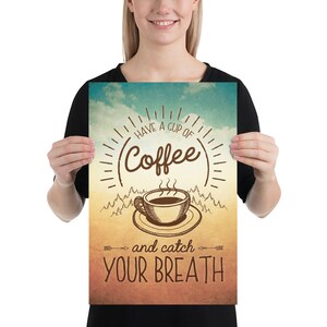 May include: A vintage-style poster with a brown coffee cup and steam rising from it. The text reads "Have a cup of coffee and catch your breath". The background is a faded blue and orange gradient with a white cloud.