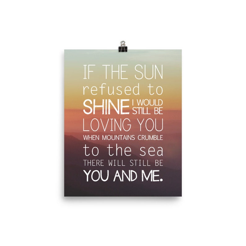 May include: A motivational quote poster with a sunset background. The text reads: "If the sun refused to shine, I would still be loving you. When mountains crumble to the sea, there will still be you and me."