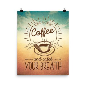 May include: A vintage-style poster with a brown coffee cup and steam rising from it. The text reads "Have a cup of coffee and catch your breath". The background is a faded blue and orange with a mountain range and sun rays.