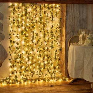 Luci a corda con fiori e foglie verdi – Luci artificiali a forma di vite per decorazioni per la casa e per matrimoni