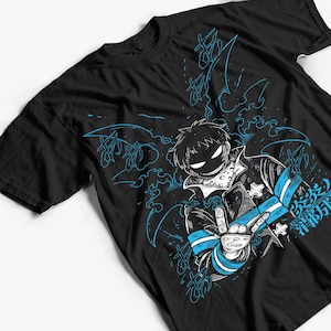 May include: Black t-shirt featuring a stylized anime character with a white and blue design. The character is making a peace sign. The design includes Japanese text and blue flame-like graphics.