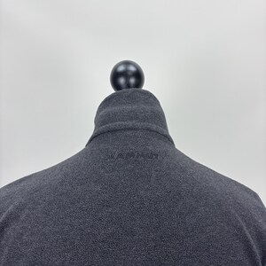 May include: A set of three ceramic nesting bowls in varying sizes. The bowls have a speckled, matte finish in cream, beige, and brown. Each bowl is rounded with a slightly flared rim.