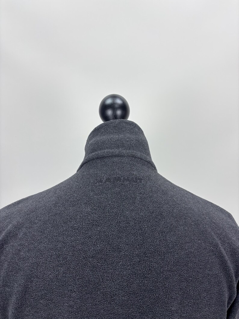 May include: A set of three ceramic nesting bowls in varying sizes. The bowls have a speckled, matte finish in cream, beige, and brown. Each bowl is rounded with a slightly flared rim.