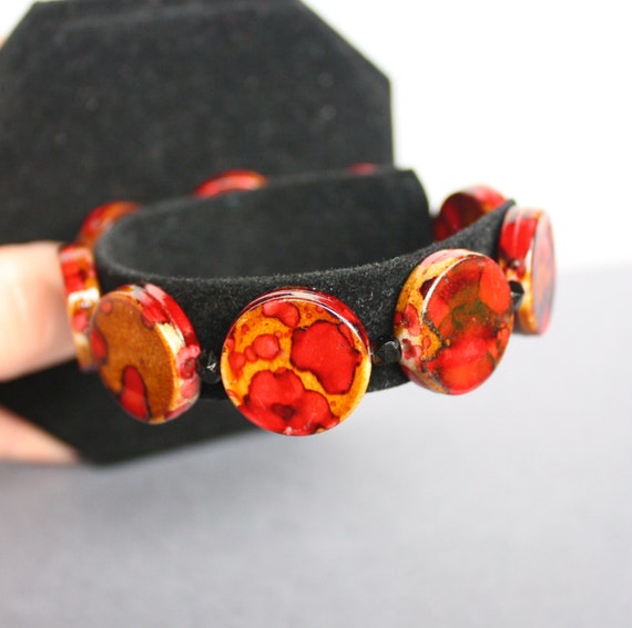 Vintage 60s Celluloid Red and Brown Circle Stretc… - image 1