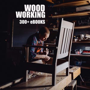 May include: A craftsman working on a wooden chair in a workshop. The image features the text "WOOD WORKING 300+ eBooks" in white. The chair is partially assembled, showcasing the woodworking process.