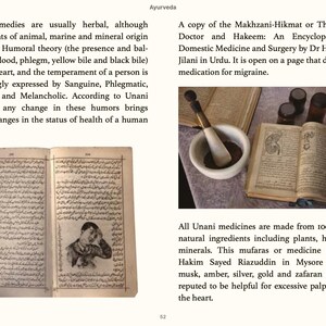 May include: An open book with text in a foreign language. The book is on a wooden table with a mortar and pestle. The mortar and pestle are made of white ceramic and have a brown wooden handle. The book is open to a page that discusses Unani medicine.