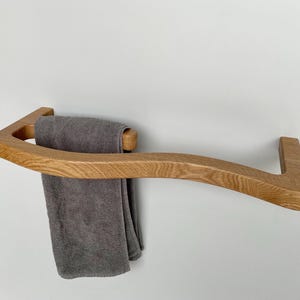 Uniquely shaped towel holder made of solid oak for 3 towels for the bathroom or kitchen / Handcrafted / Modern towel holder