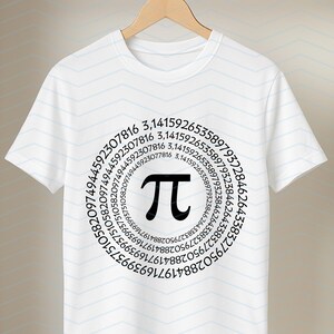 May include: A white t-shirt with a black Pi symbol at the centre of a circle of numbers. The digits of Pi are arranged around the symbol. The t-shirt is hanging on a wooden hanger.