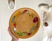 Vintage 1960 s Rio Grande Hand Painted Wooden Ware Footed Fruit Veggie Bowl. Painted pot, carrot, corn, vines, peppers, and a hat.