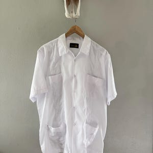 White Yucateco Men&#39;s Guayabera. Made In Mex..The Guayabera is a classic Latin American four pocket short sleeved Shirt.