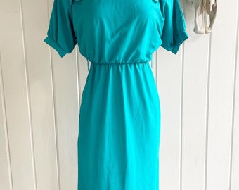 Vintage “Doni Girl of California zinc.” Turquoise Dress.