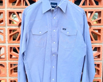 Wrangler Large Cowboy Cut Work Western Long Sleeve Shirt with Pearl Snap Buttons. Blue with gold threading. Snap buttons.