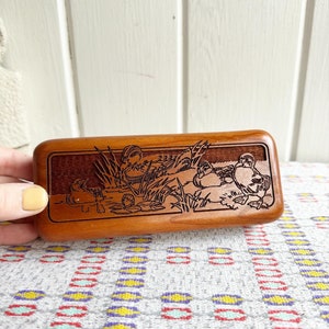 Wood Engraved Red Felt Lined Duck Pen Box. Duck with her Ducklings in a pond with grass and water Lilies.