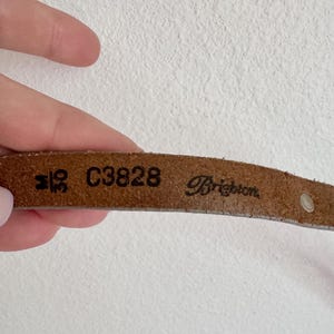 May include: A set of three ceramic mugs with a speckled, matte finish in cream, light grey, and dark grey. Each mug has a simple, minimalist design, suitable for coffee or tea.