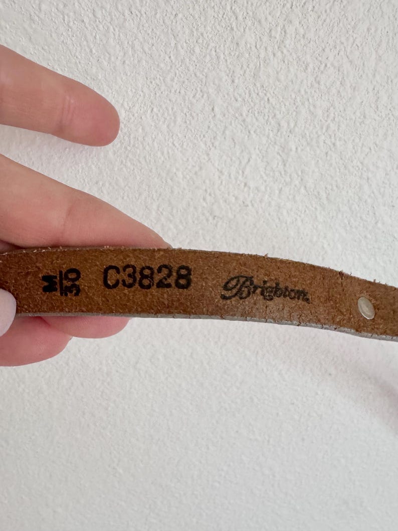 May include: A set of three ceramic mugs with a speckled, matte finish in cream, light grey, and dark grey. Each mug has a simple, minimalist design, suitable for coffee or tea.