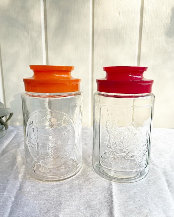 Vintage Anchor Hocking spring and bridge Glass Jars With Red and Orange  Plastic Lids. Juice Carafe. 