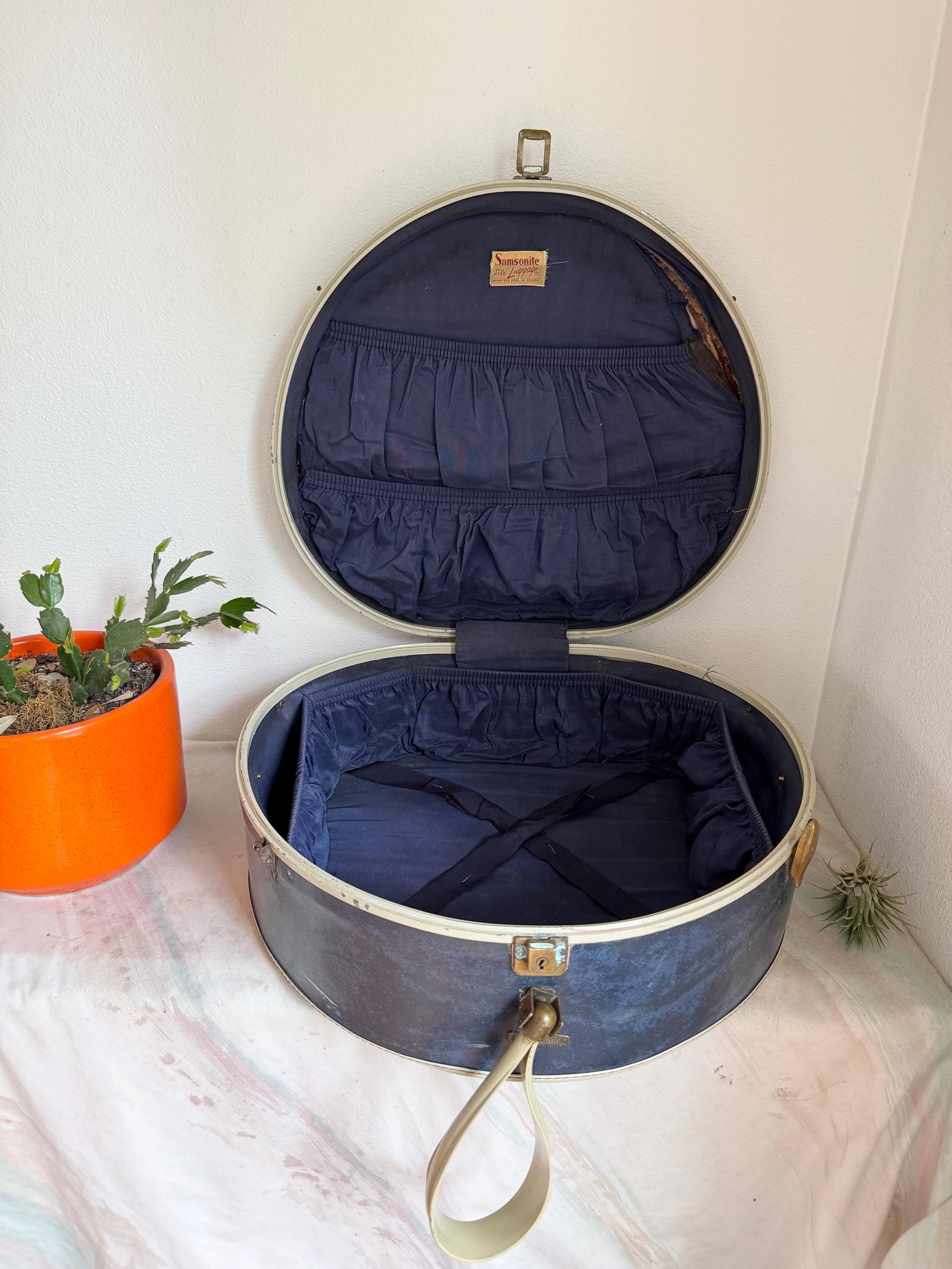 Vintage Blue Samsonite Round Suitcase With Rounded Sides and a