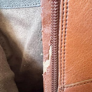 May include: A set of three ceramic mugs with a speckled, matte finish. The mugs are in shades of cream, light brown, and dark brown. Each mug has a simple, minimalist design, perfect for coffee or tea.