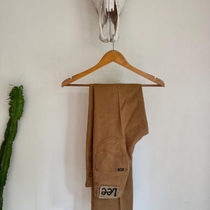 Vintage 70’s Deadstock Brown Lee Denim Pants. 27 x 34. USA. cotton/poly.