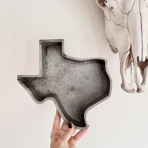 Vintage cast aluminum Texas-shaped cake pan or serving tray.  1969. Texas Bake Pan.  Heritage Garden Museum. Woodville, TX.