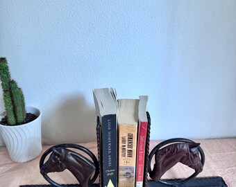 Metal Horse Bookends. Possibly cast iron. Horse sculpture. Equestrian. Western home. Pre owned.