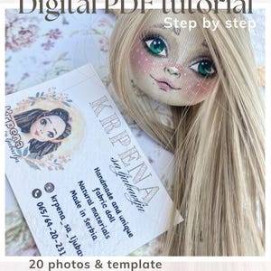 Op de afbeelding: Een digitale PDF-tutorial voor het schilderen van poppengezichten. De afbeelding toont een poppengezicht met blond haar en groene ogen, samen met een visitekaartje met de tekst "KRPENA sa Ljubavlju". De tutorial bevat 20 foto's en een sjabloon, met stapsgewijze instructies.
