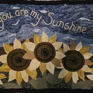 You are My Sunshine Wool Rug Hooking Pattern or Punch Needle Pattern.  Sunflowers in a field with an overcast sky.