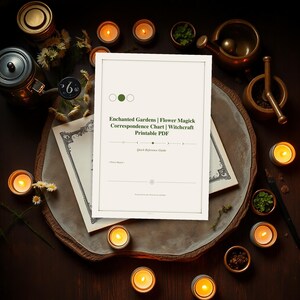 May include: A printable PDF titled "Enchanted Gardens | Flower Magick Correspondence Chart | Witchcraft." The image features the document on a wooden tray, surrounded by lit candles, herbs, and a mortar and pestle, creating a mystical aesthetic.
