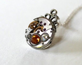 Pendentif Ancien mouvement de montre des années 50 Swarovski orange et marron