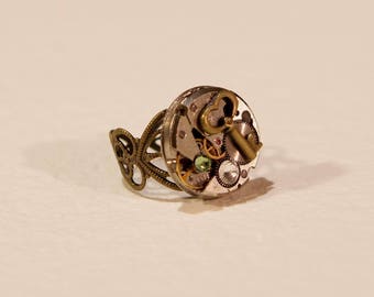 From the 1950's watch movement ring, key bronez and green swarovski