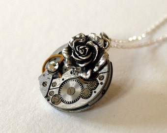 Pendentif Ancienne montre Swarovski diamant et charm rose métal argenté