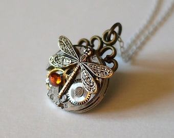 Old watch pendant from the 50s, small bronze dragonfly and brown Swarovski