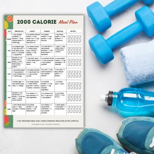 May include: A 2000-calorie meal plan with a 7-day layout, featuring breakfast, lunch, dinner, and snack options. The plan includes a variety of foods like oatmeal, chicken, and vegetables. Blue dumbbells, a water bottle, and athletic shoes are in the background.