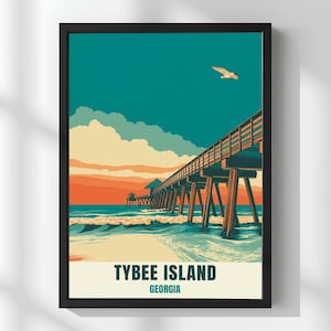 May include: Framed art print depicting a pier stretching into the sea beneath a teal sky with a seagull. The artwork has a retro style with a colour palette of teal, orange, and beige. The text "TYBEE ISLAND GEORGIA" is at the bottom.