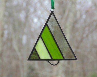 One small Christmas tree, stained glass suncatcher ornament, abstract glass Xmas tree