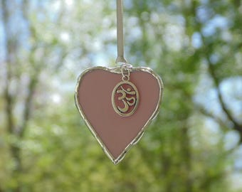 Stained glass plum heart suncatcher with Om symbol charm