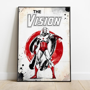 Op de afbeelding: Ingelijste stripboekkunstprint met "The Vision". Het kunstwerk toont een rood-witte superheld tegen een rode cirkel, met de titel "The Vision" bovenaan. In vintage stripboekstijl.
