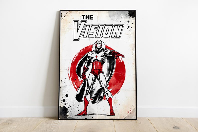 Op de afbeelding: Ingelijste stripboekkunstprint met "The Vision". Het kunstwerk toont een rood-witte superheld tegen een rode cirkel, met de titel "The Vision" bovenaan. In vintage stripboekstijl.