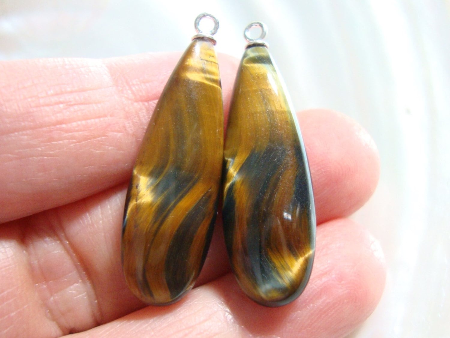 Gorgeous Tiger Eye Smooth Elongated Pear Briolette, Top Drilled