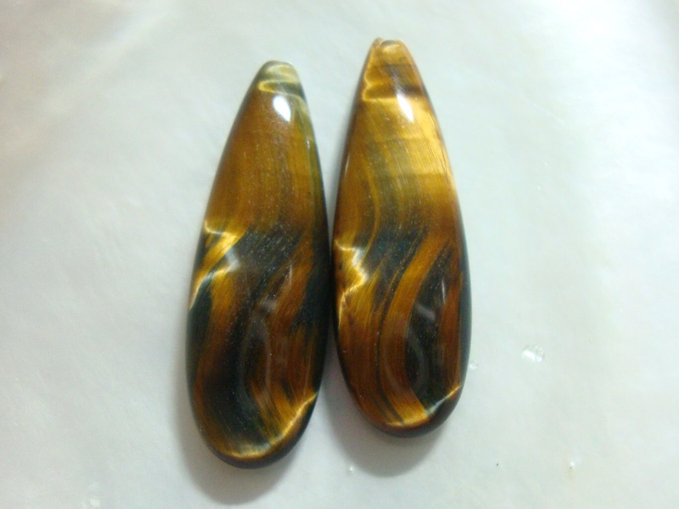 Gorgeous Tiger Eye Smooth Elongated Pear Briolette, Top Drilled