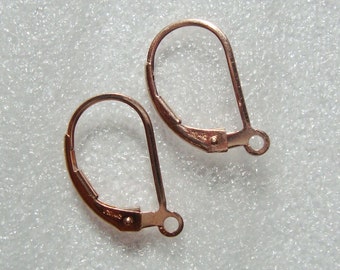 May include: Two rose gold earring hooks, also known as leverback earring findings, are shown on a white background.