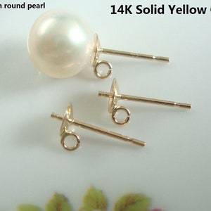May include: A pair of 14K solid yellow gold earring posts with a 8mm round pearl.